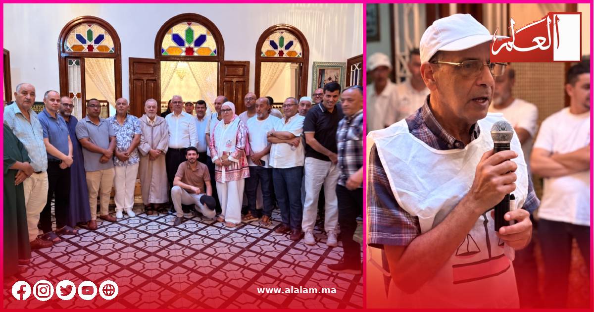 صورة جماعية للمشاركين في اللقاء إلى جانب إحدى مداخلات ممثلي العدول