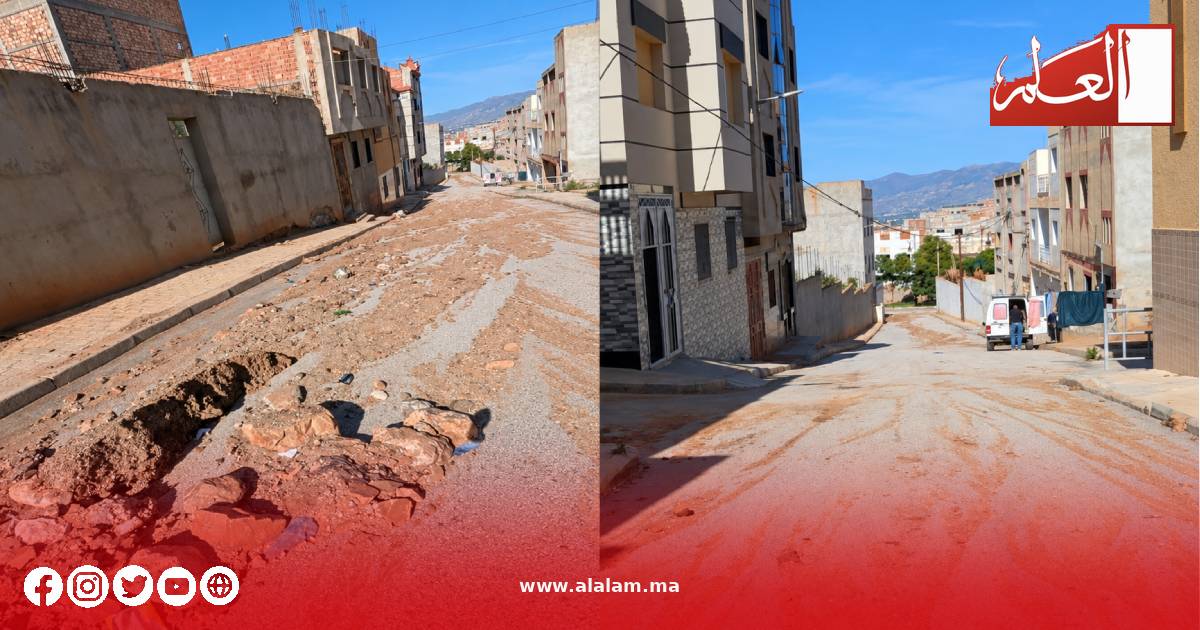 أوحال ومخلفات الفيضانات بشارع في حي بوغرمان تنتظر تدخل الجهات المعنية