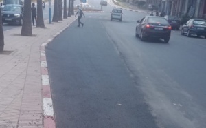 عملية التزفيت تكتمل بأحد الشوارع الرئيسية بمنطقة البرنوصي